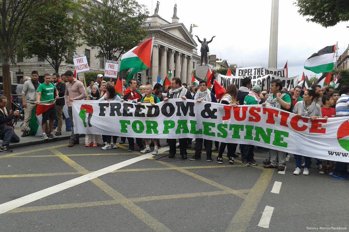 People come together to support Palestine as they walk towards the Israeli embassy in Dublin, Ireland [Tommy Morrin/Facebook]